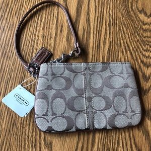 Coach signature C Khaki Brown Stitch Canvas Wristlet New with tags.